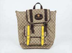 lot 58466 image: Gucci GG Canvas Backpack w Yellow Leather Straps