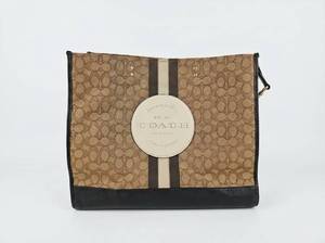 lot 62745 image: Coach Signature Canvas Messenger Bag w Leather Trim