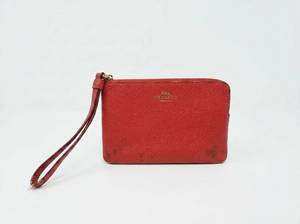 lot 62808 image: Coach Red Crossgrain Leather Wristlet