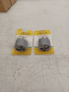 lot 21005 image: American Standard Ceramic Cartridge 2.25 X 1.75 2 Pack