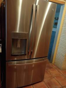 lot 963 image: GE Profile Refrigerator.   70 x 37 x 32