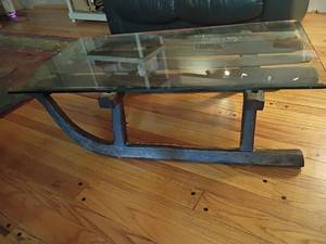lot 970 image: Glass Top Coffee Table with Vintage Wooden Sled as the Base.  13 x 42 x 24