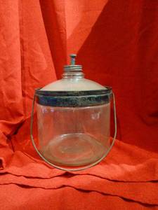 lot 1003 image: Perfection Stove Company glass kerosene  jar with lid and handle