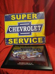 lot 1134 image: Super Chevrolet Service Tin Sign with 1965 Shelby Cobra 427 SC Motor