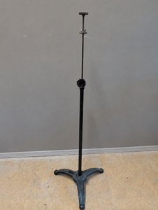 lot 1310 image: Vintage adjustable cast-iron stand by Eck co Century. Stands 54 in tall at the shortest height.