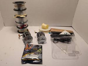 lot 1324 image: Vintage Shakespeare Marhoff 1964 casting reels and Line Lot with Chums Splash Bags