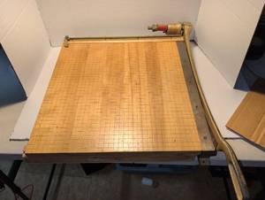 lot 1335 image: Paper Cutter with Wooden Base and Metal Ruler 18x19