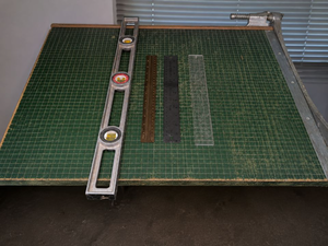 lot 1373 image: 25x26 in paper cutter with straight edge rulers and level