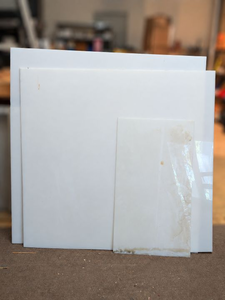 lot 1385 image: 3 white Acrylic Sheets. Largest is 52x51