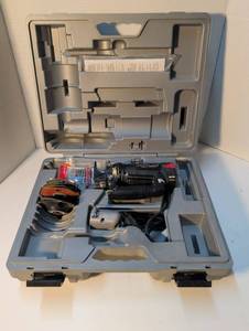 lot 1391 image: Rotozip Rebel Spiral Saw Kit with Case. May be missing parts