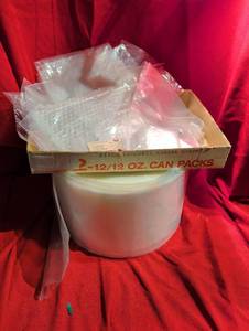 lot 1454 image: Clear 8 inch Poly Bag Roll and Assorted Clear Plastic Bags Lot with dispenser rack