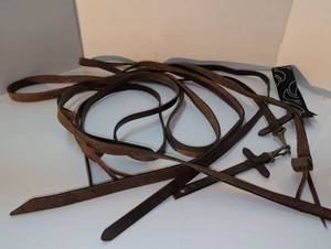 lot 1481 image: Leather pieces. May be part of Horse Bridle