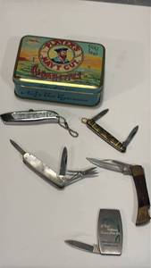 lot 1511 image: Players Navy Cut Cigarettes Tin with Folding Knives and Accessories Lot