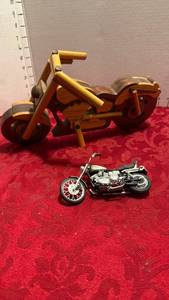lot 1561 image: Wood motorcycle and die cast motorcycle model
