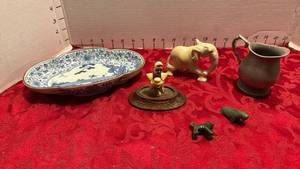 lot 1567 image: Stone elephant, carved figurine, porcelain dish and metal pitcher