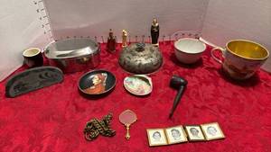 lot 1573 image: Painted shell, stone etching from Russia, tin mug, mug and more