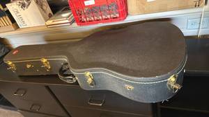 lot 1617 image: Guitar case with guitar stand