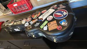 lot 1629 image: Carlton Guitar case  with guitar stand
