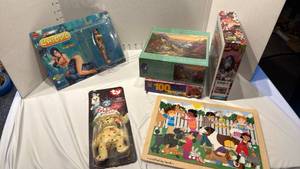 lot 1637 image: Melissa & Doug puzzle, TY beanie baby, Jungle Girl and puzzles