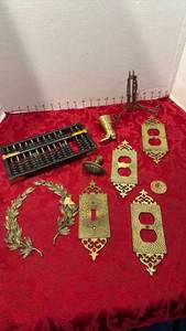 lot 1689 image: Abacus, brass outlet cover plates and wall decor