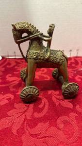 lot 1694 image: Vintage brass horse and rider figurine on wheels 5x4.5