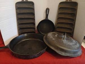 lot 1805 image: Cast Iron Cookware Lot 2 skillets,  Griswold  Self Basting Skillet Cover No. 8  and 2 Corn bread Molds