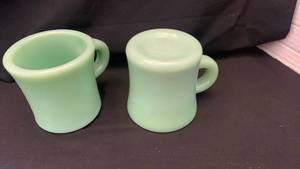 lot 1906 image: Pair of fire King Green Glass Mugs with Handles