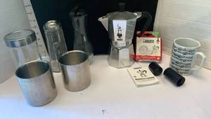 lot 1939 image: Bialetti espresso maker, cups, stirrer, misc jars