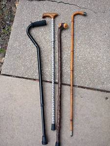 lot 2054 image: Walking Canes and Walking Sticks.   Cane is adjustable