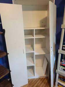 lot 2102 image: White cabinet with adjustable shelves, door hinges need reattached, 72X30X16.