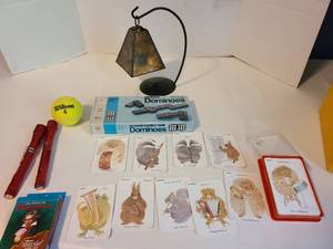 lot 2113 image: Classical composer and animal music instruments playing cards, flashlights, tealight holder, dominoes
