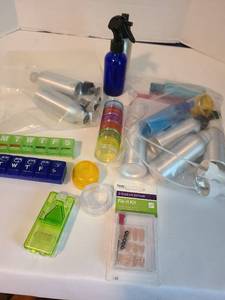 lot 2124 image: Eyewear Repair Fix-It Kit with spray bottles and pill containers