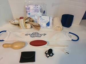 lot 2132 image: Small magnifier, Bed Buddy microwave heat pack, Ace bandages, medical braces, more
