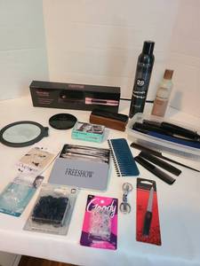 lot 2133 image: Tervilix electric hot comb, Redken and Aveda hair products, stainless blemish kit, hair ties, more