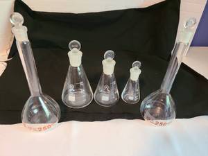 lot 2145 image: Five glass laboratory bottles with stoppers