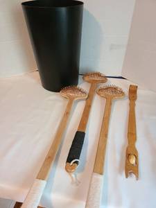 lot 2149 image: Four back scratchers and a black plastic wastebasket