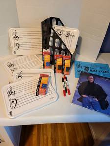 lot 2156 image: Dry erase boards, markers, erasers, music books in plastic file bin