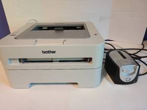 lot 2166 image: Brother laser printer HL-2220 abd Voyager Q hard drive docking station