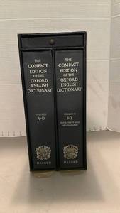 lot 2211 image: Oxford Compact Edition English Dictionary 2-Volume Set with Case and magnifying glass