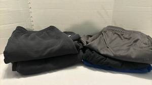 lot 2249 image: Five mens pants - size large.  Two sweat pants and three light weight