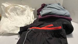 lot 2255 image: Five v-neck white tshirts, two pockets tees, sweatshirt, sweatpants and two shorts