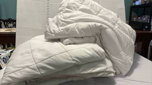 lot 2265 image: Two white comforters- not sure of size, but probably queen