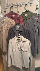 lot 2404 image: Mens long sleeve button up shirts size unknown tags taken out possible M and L