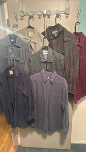 lot 2406 image: Mens long sleeve button up shirts size unknown tags taken out possible M and L