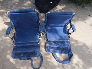 lot 4100 image: 2 Blue Folding Stadium Chairs with Arm Rests and Storage Pockets