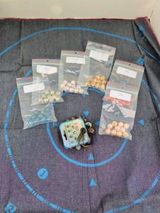 lot 4316 image: Toy Chart Marble Collection 7 Bags Assorted Colors marbles and denim mat