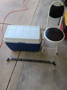 lot 4515 image: Coleman cooler, folding stool, automotive clothing rack.