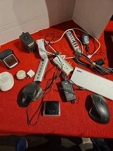 lot 1233 image: Electronics Lot Power Strips, USB Hubs, Computer Mice, Smart Plugs, Voltage Converter