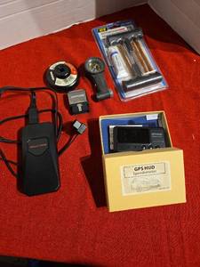 lot 1235 image: Automotive Accessories Lot Bully Dog GPS HUD Speedometer Pittsburgh Tire Repair Kit