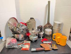 lot 3021 image: Coleman and other camp stoves, camping cookware, hand warmers, axe and more